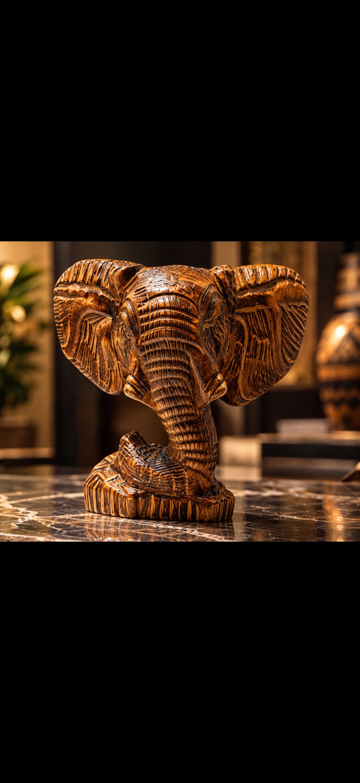 Detailed hand-carved elephant portrait